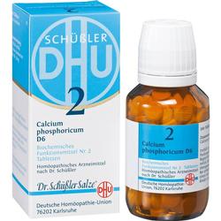 Braune Flasche und blaue Schachtel mit weißen Tabletten, homöopathisches Mittel.