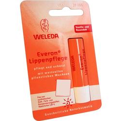 Ein orangefarbener Lippenpflegestift von Weleda in einer Verpackung.